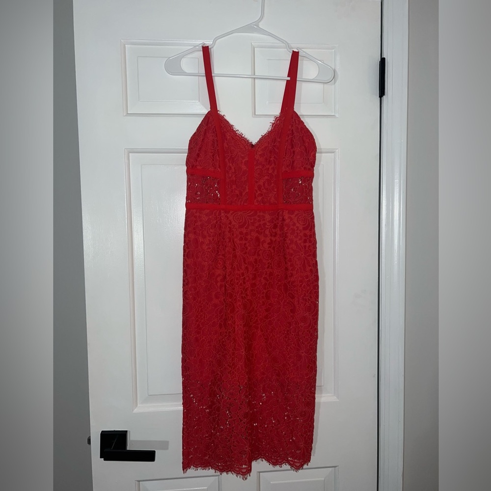 Express midi sheath dress. Lacy with spaghetti straps. Zips up the back. Size 2